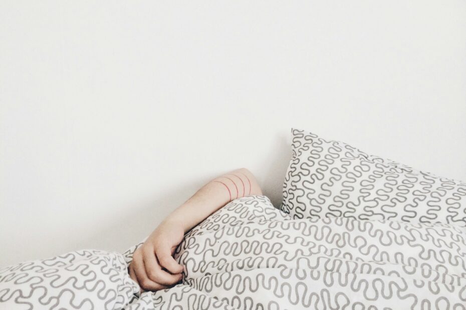 person lying on bed